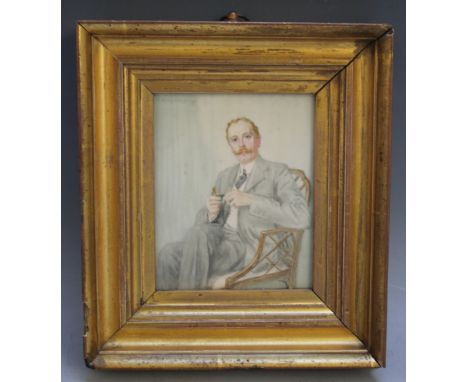 A PORTRAIT MINIATURE OF A SEATED GENTLEMAN, in gold framed, indistinctly signed and dated 1908 upper left, framed and glazed,