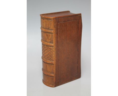 A 19TH CENTURY MAHOGANY TABLE SNUFF BOX, formed as a antique novel, sliding panel to one side, L 12.5 cm