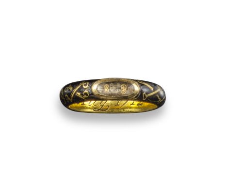 A Queen Anne gold memento mori ring, centred with an oval locket compartment containing a skull and cross bones between the g