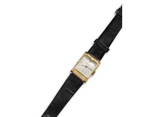 An 18ct gold wristwatch by Tiffany &amp; Co, the signed silver dial with baton numerals, manual movement, gold case with insc