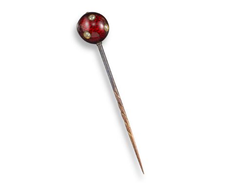 A gold and enamel spherical stick pin, set with diamonds in red guilloche enamel, 6.5cm high, with a turquoise and white enam