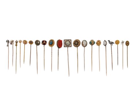 A group of twenty stickpins, including a diamond-set bird stickpin (one leg broken), a diamond-set platinum and gold question