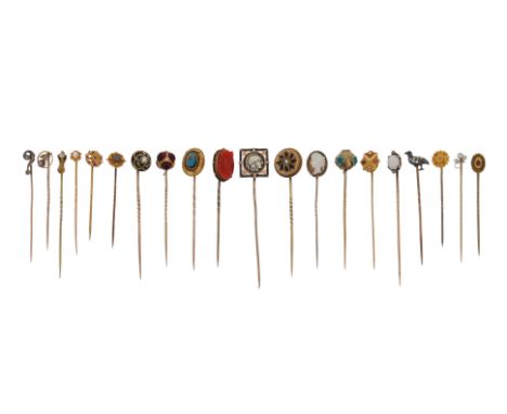 A group of twenty stickpins, including a diamond-set bird stickpin (one leg broken), a diamond-set platinum and gold question