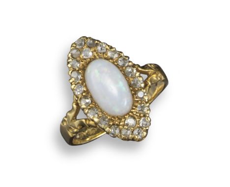 A Victorian opal and diamond navette-shaped ring, the white opal cabochon is set within a surround of diamonds in yellow gold