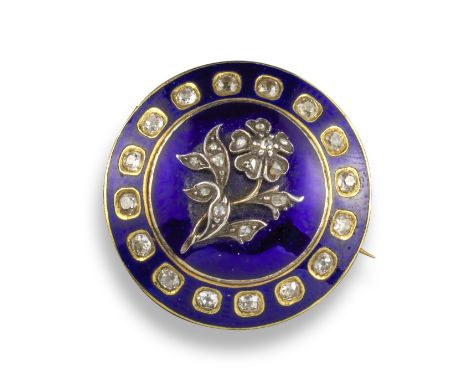 A late 19th century blue enamel and diamond brooch, surmounted with a diamond-set forget-me-not within cushion-shaped diamond