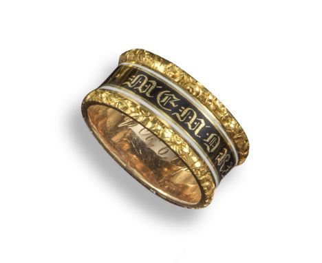 An early 19th century gold and enamel mourning ring, the central black and white enamel band spelling out 'In memory of' betw