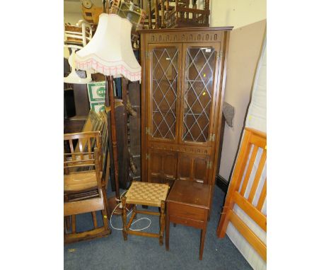 AN OAK CORNER CABINET, TWO LAMP STANDARDS, OAK SEWING BOX AND STOOL (5)