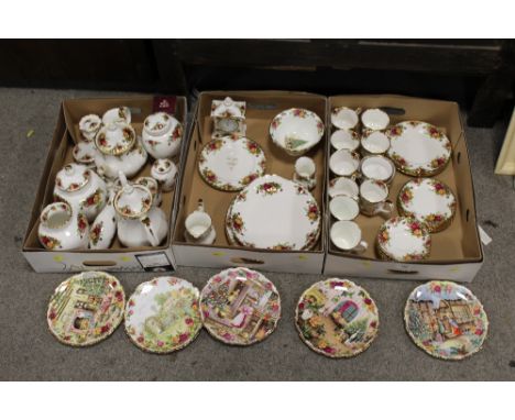 A QUANTITY OF ROYAL ALBERT OLD COUNTRY ROSES CERAMICS TO INCLUDE A COFFEE POT, MANTEL CLOCK, CUPS AND SAUCERS ETC.