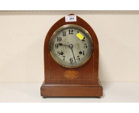 A DOME TOPPED INLAID MAHOGANY MANTEL CLOCK