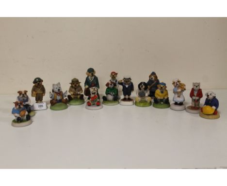 A COLLECTION OF ROBERT HARROP DOGGY PEOPLE FIGURES COMPRISING OF PUPPIES INCLUDING DPFG16 BORDER TERRIER PUPPY ARMY CADET DPF