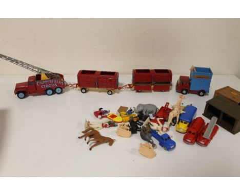 A CORGI MAJOR CHIPPERFIELDS CIRCUS INTERNATIONAL 6 X 6 TRUCK TOGETHER WITH A TRACTOR UNIT AND OTHER TOYS ETC