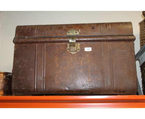 A LARGE VINTAGE TIN TRUNK