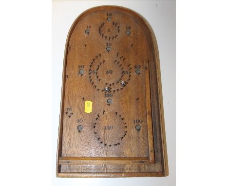 A SMALL VINTAGE WOODEN BAGATELLE GAME, L 37 CM 