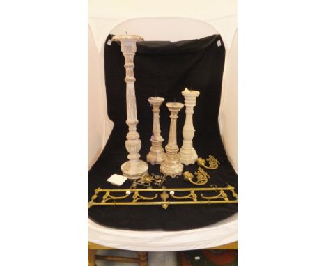 A pair of painted wooden pricket candlesticks and two others, a copper coal helmet, set of brass coat hooks, sconces, two pai