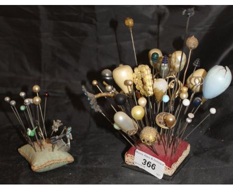 A collection of Victorian and later hat pins with mainly pearl and pearl effect decoration