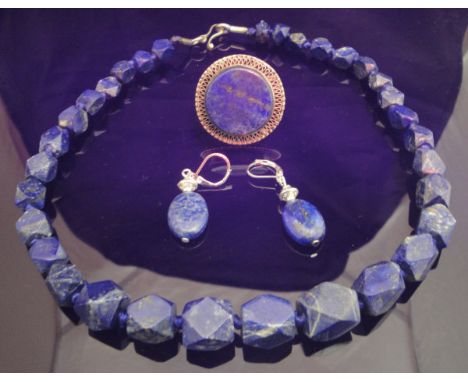 A lapis lazuli beaded necklace, together with similar earrings and ring