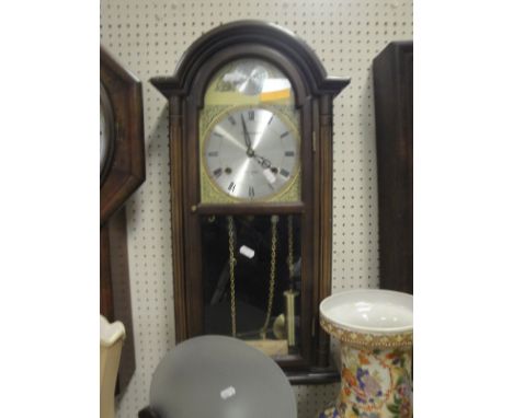 A 20th Century wall clock, the dial with Roman numerals marked "President" and the arch marked "Tempus Fugit", together with 