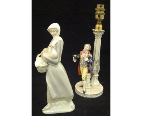 A Dresden table lamp as a gentleman in 18th Century dress by pillar, Lladro figure of a girl with chicken and basket of eggs 