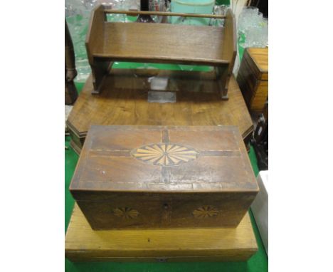 A 19th Century fan marquetry inlaid mahogany tea caddy (interior missing), an oak cased games compendium, a 20th Century oak 