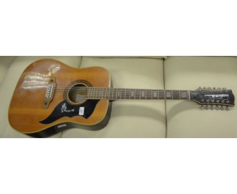 An Eko Ranger XII 12 string guitar with original label to interior and emblazoned finger plate No'd 351116 verso