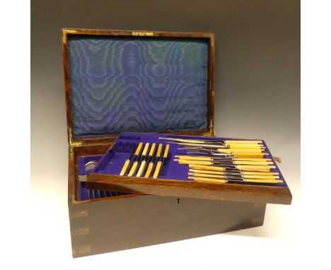 An early 20thC brass bound Canteen of silver plated Cutlery, with two lift out fitted trays and fitted base section, Old Engl