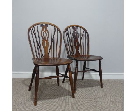 A Pair of 19thC ash and elm Windsor side Chairs, hooped stick and pierced splat backs, above saddle seats, raised on turned l