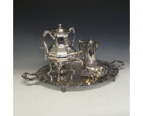 An early 20thC silver plated Samovar,&nbsp;initialled and dated 1910, with ivory tap handle, complete with burner, 33cm high,