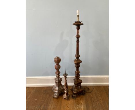 A continental giltwood and gesso Baroque style Altar&nbsp;Candlestick, now converted to electricity, H 137 cm, together with 