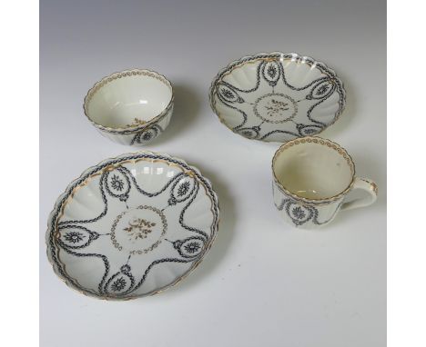An 18thC&nbsp;porcelain Tea Bowl and Saucer, probably first period Worcester, with fluted edge decorated in gilt and black sw