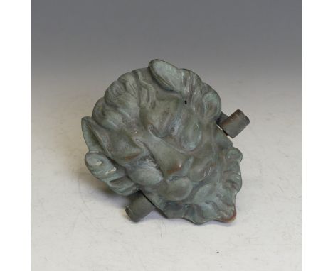 An Antique green man door Knocker, W 12.5 cm x L 20 cm.