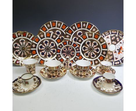 A quantity of Royal Crown Derby 1128 pattern Pieces, comprising two large Dinner Plates, two smaller Plates, two Teacups and 