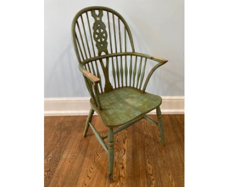 A green painted Windsor Chair, hoop stick back with shaped and pieced splat, moulded saddle seat raised on turned legs, W 54.