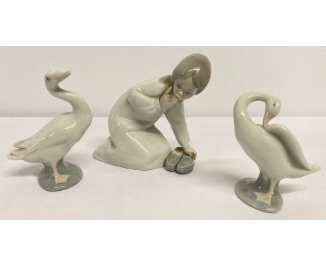 3 Lladro Spanish ceramic figurines, "Little Girl with Slippers" together with 2 figures of geese.  
