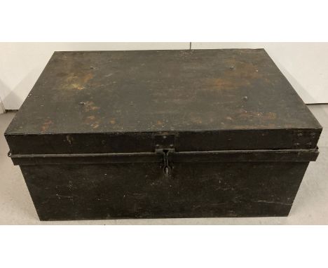 A large metal tin trunk with carry handles, painted black.   Approx.76 x 53 x 35cm tall.