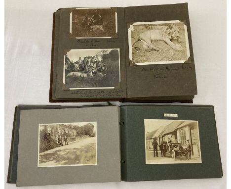 2 small early 20th century photograph albums containing a quantity of black and white photos.  To include 1914 album containi