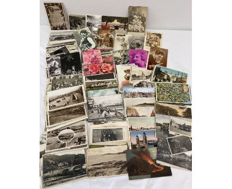 100+ antique and vintage postcards.  To include: coastal towns, greetings and portrait cards. 