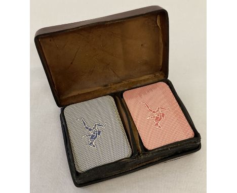 A small red leather Liberty playing card case with 2 sets of miniature playing cards, one unopened.  Gold decoration to edges