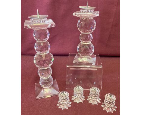 A collection of 6 vintage Swarovski crystal candle holders all bearing the block mark.  Comprising: large 5 ball candle stick