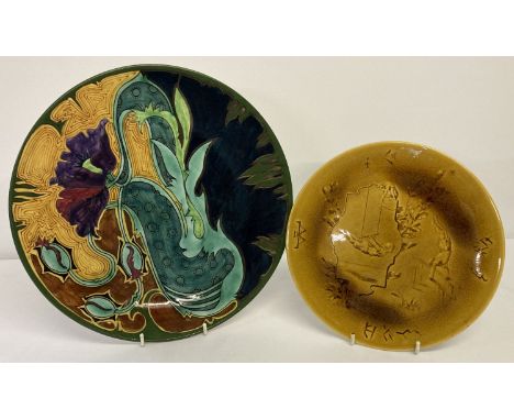 A Dutch ceramic charger with Art Nouveau style floral decoration.  Together with a French H.B &amp; Cie Choisy Le-Roy plate i