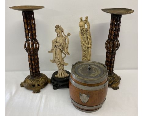 A pair of metal cane effect candlesticks together with a pair of oriental resin figures  and a wooden biscuit barrel with cer