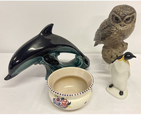 4 items of vintage Poole pottery.  A large dolphin, large owl signed by Barbara Linley Adams, penguin and a hand painted flor