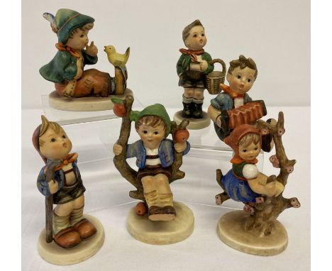 6 vintage Goebel ceramic Hummel figurines of children, dating from the 1950's.  