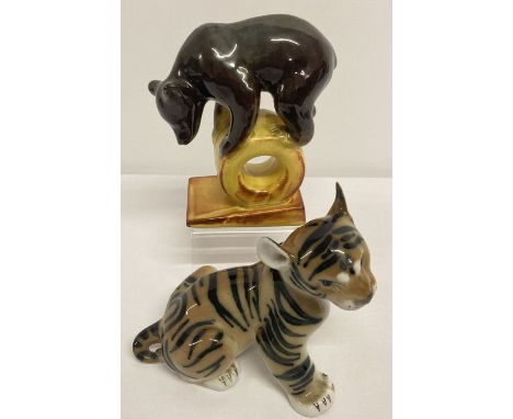 2 ceramic Russian Lamonosov animal figurines. A tiger cub and a bear balancing on a drum.   Bear approx. 14cm tall.