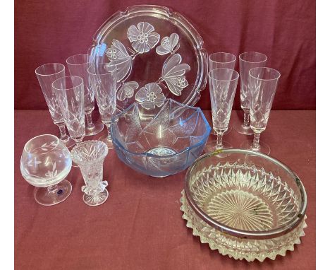 A box of assorted vintage glassware items.  To include a set of 8 cut glass stemmed champagne glasses and a cake plate with b