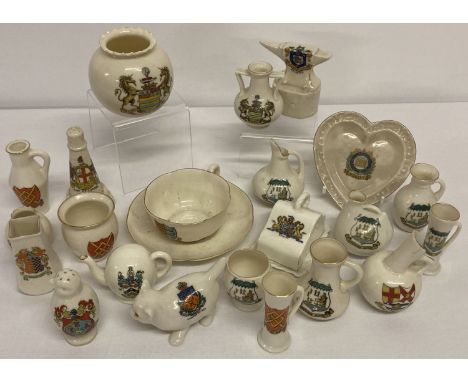 A collection of assorted vintage crested ware ceramics to include Goss and Arcadian.  To include novelty pieces in the shape 