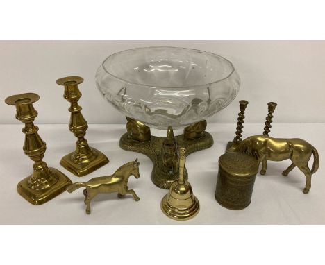 A box of assorted vintage brassware items to include candlesticks and horse figurines.  Together with a large tripod bowl sta