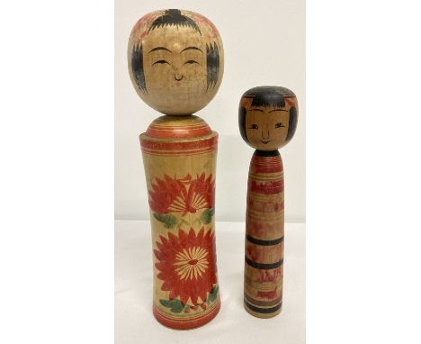 2 vintage wooden hand painted Japanese Kokeshi dolls.  Both signed to underside.  Tallest approx. 30cm tall, smaller approx. 