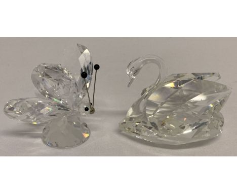 2 vintage Swarovski Crystal animal figurines; a swan together with a butterfly.  Both with block logo etched to base, Swan al