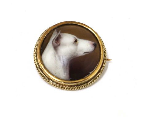 William Ford (19th century)Study of a bull terriersigned on the reverse 'W B Ford 1886', a miniature in enamel and gilt2cm di