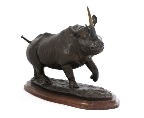 *Terry Owen Matthews (b.1931) A bronze rhino, on a wood plinthsigned and dated 1987, numbered 2/10 on a wooden base47cm wide2